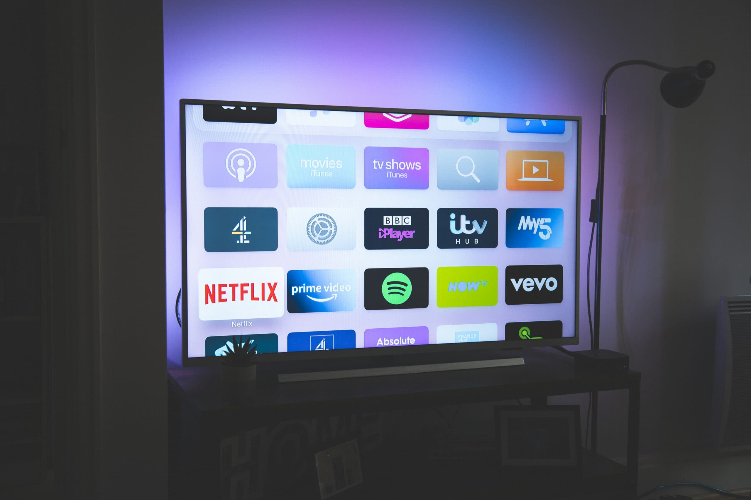 Beginner's glossary of common IPTV terms displayed on a smart TV screen